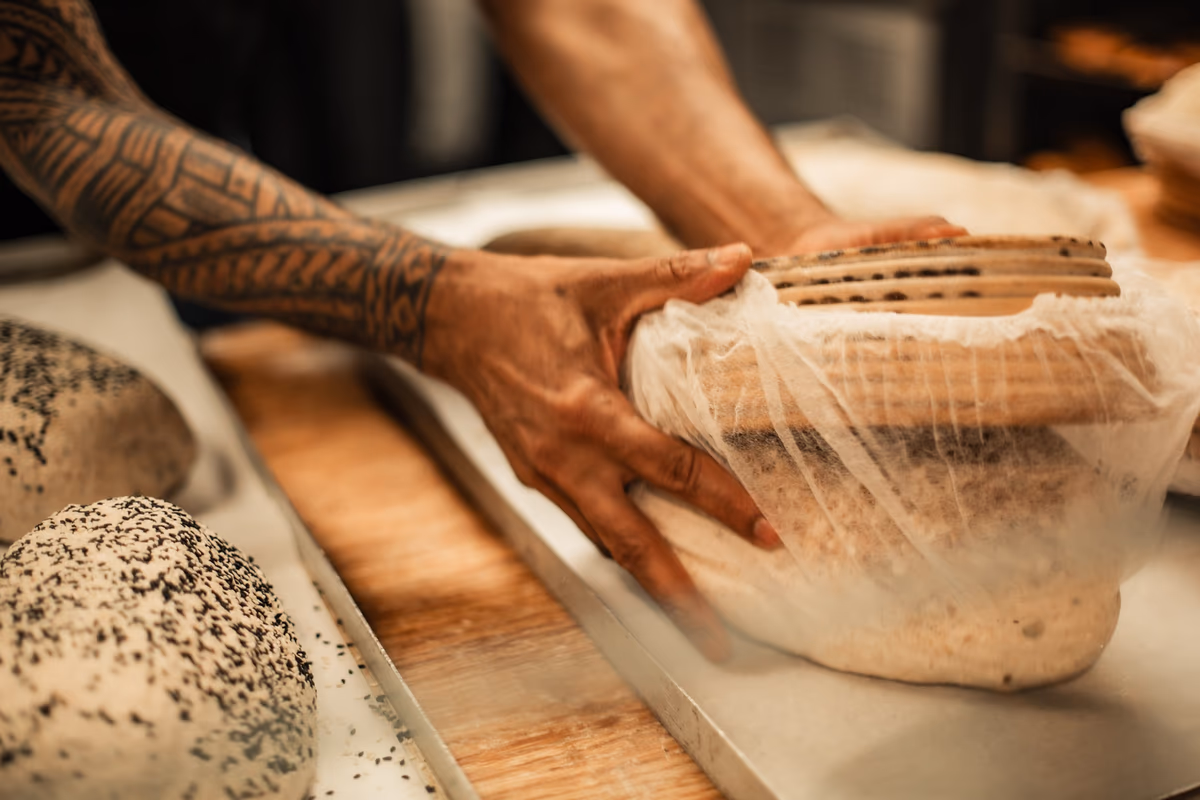 Crafty Baker — hands shaping sourdough loaves